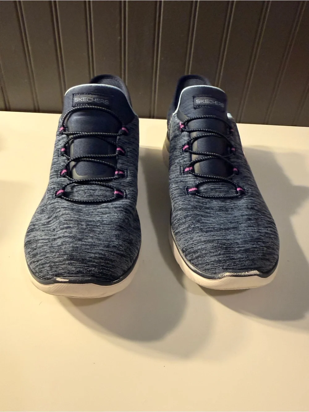 Skechers women’s slip navy -On Athletic Sneakers with Pink Accents